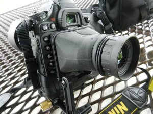 the lower left portion of the vertical adjustment rail contains the 1/8" hex wrench