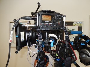 I like to be able to easily detach the carrying strap using the plastic snap buckles, for rig placement- or leaving it attached for use as a field mixer